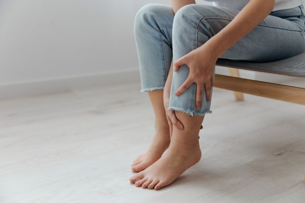 woman suffering calf pain