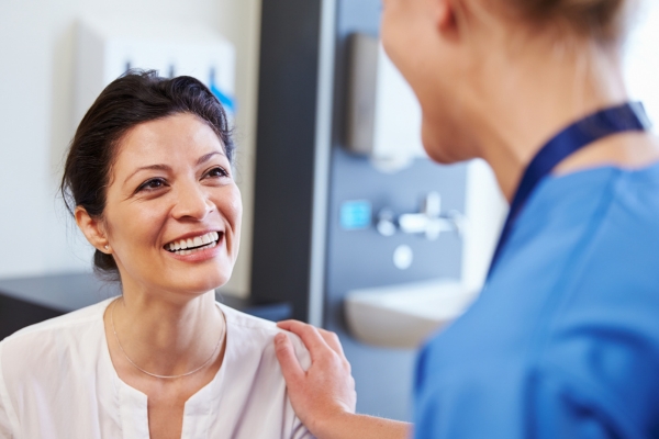 patient being reassured by nurse